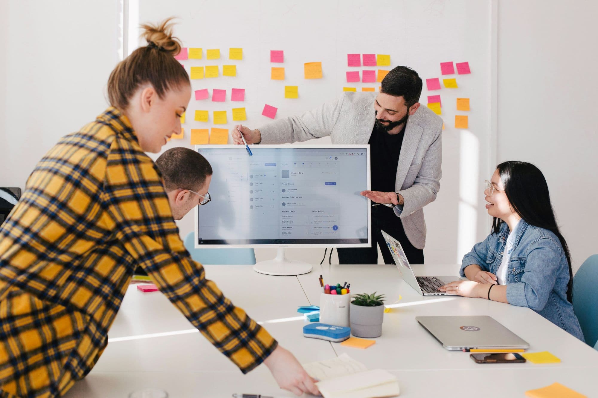 Team working around computer